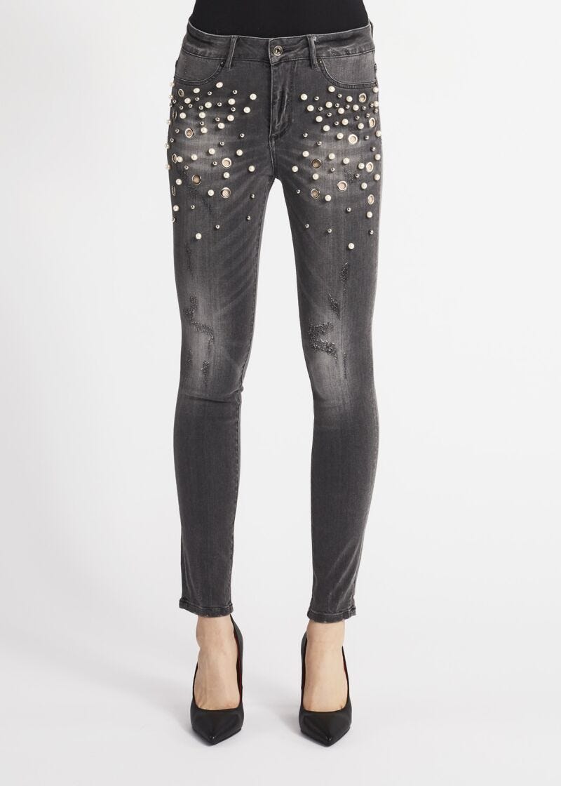 Skinny jeans with jewelled details 