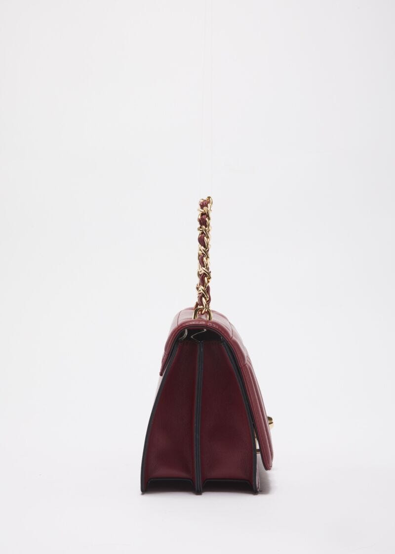 Strap in quilted faux leather