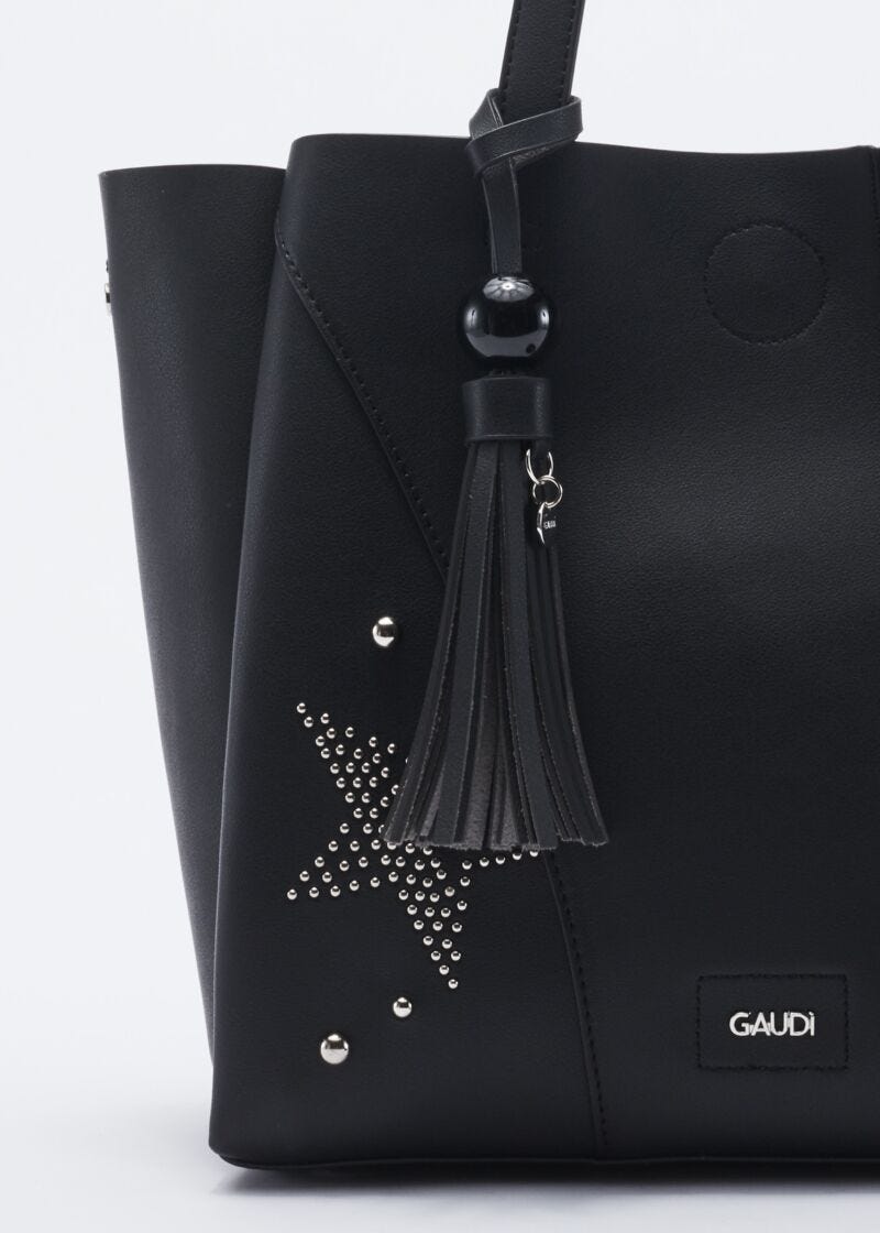 Bag with metal studs and star pattern
