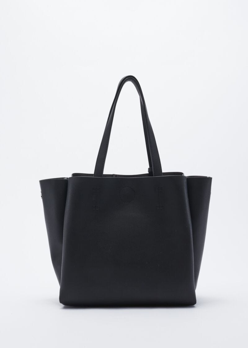 Bag with metal studs and star pattern
