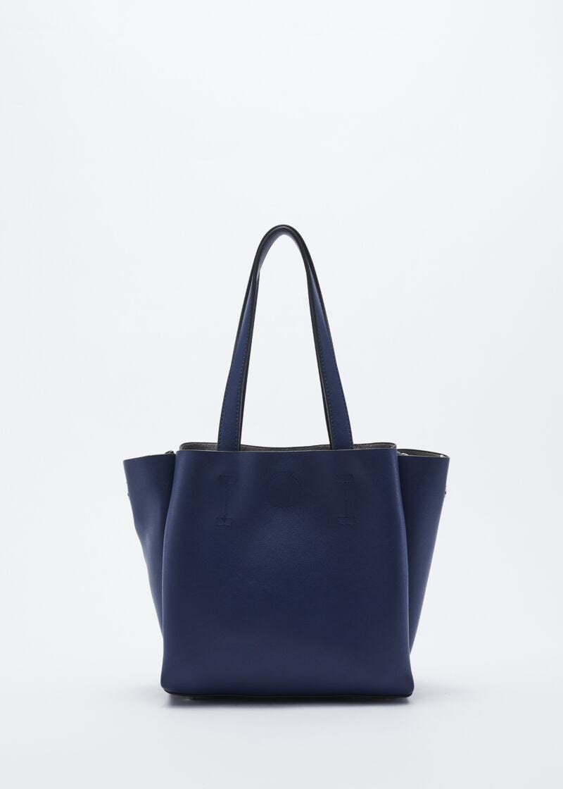 Bag with studded hanging tassels