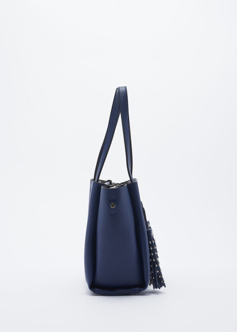 Bag with studded hanging tassels
