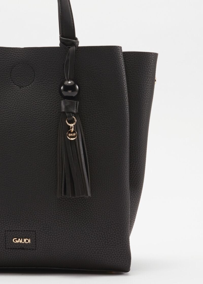 Bag with contrasting colour handles