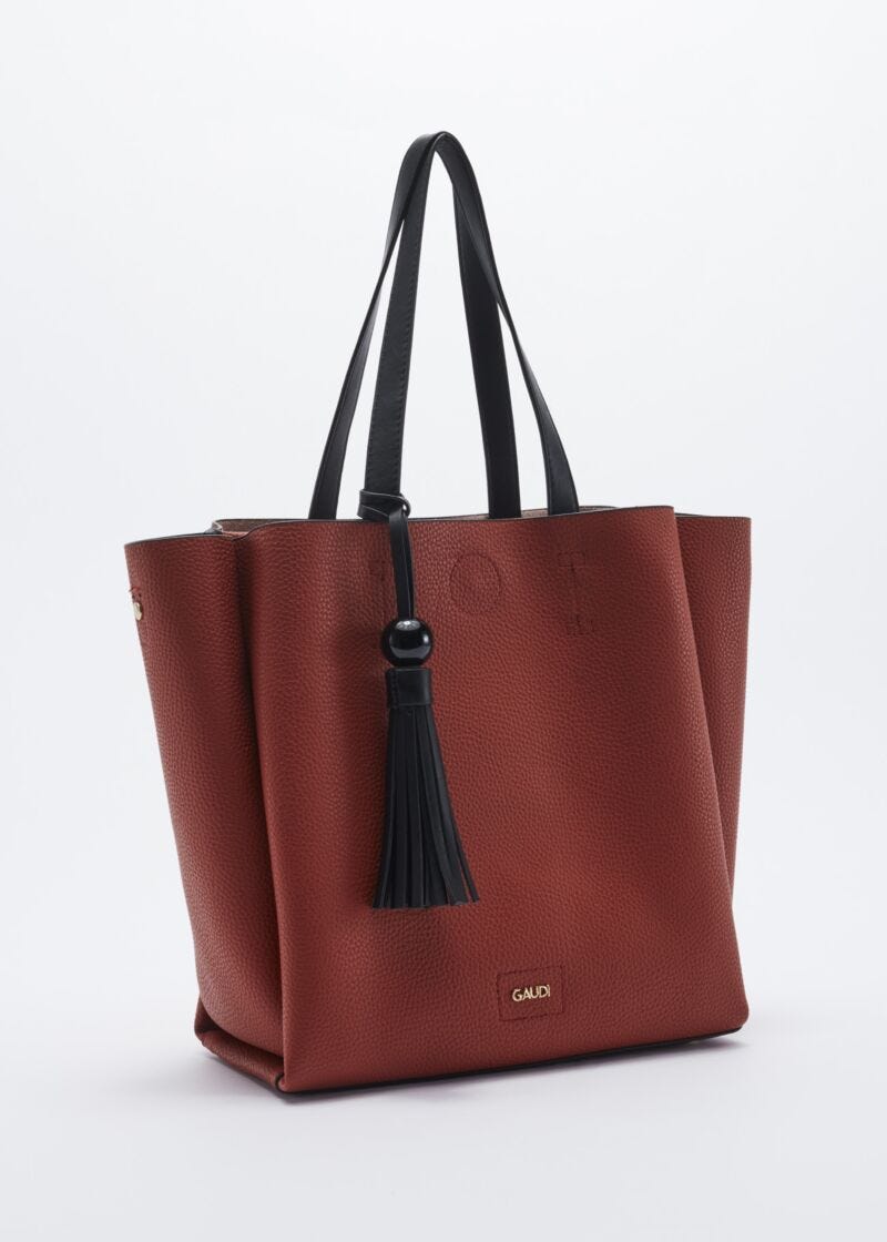Bag with contrasting colour handles