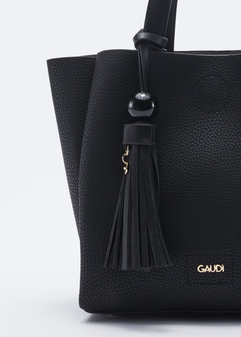 Bag with contrasting colour handles