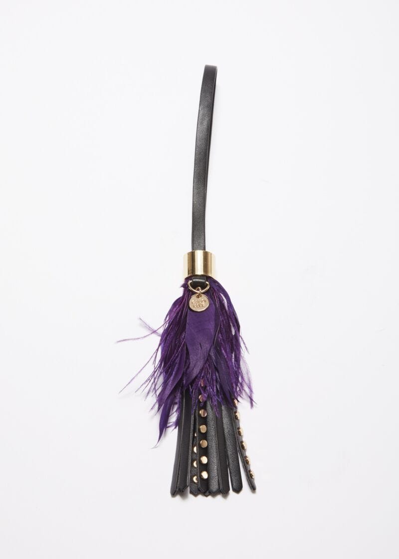 Keyring with studs and feathers