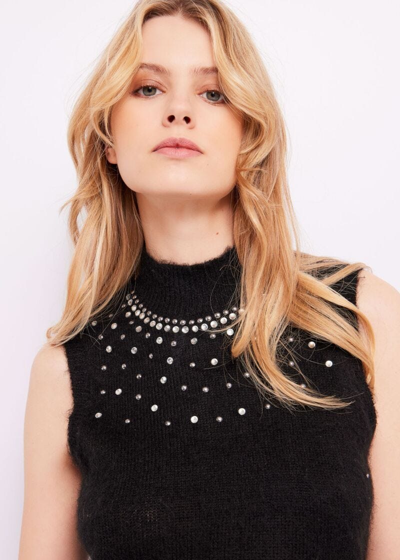 Top with rhinestones and studs