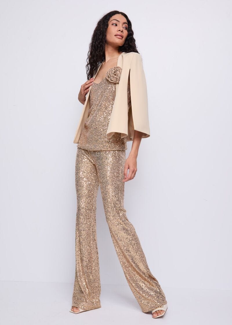 Top da donna con spilla fiore