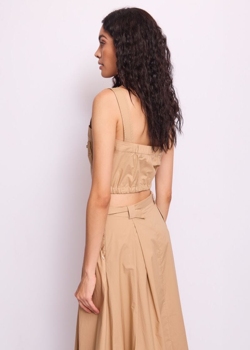 Top da donna beige con bottoni logati