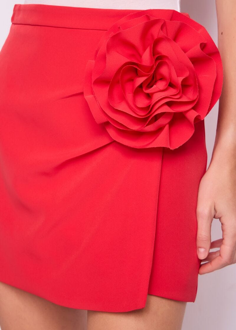 Red miniskirt with pin