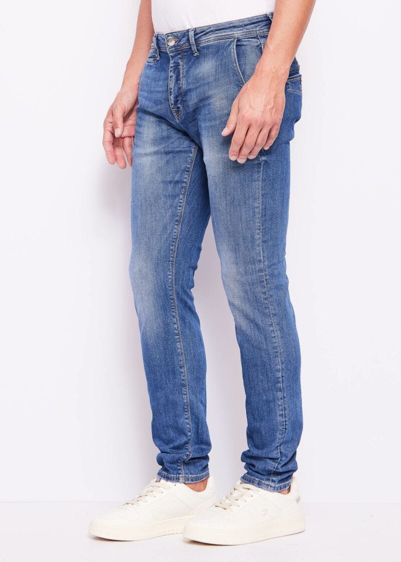 Vaqueros ajustados chinos de algodón desgastado para hombre