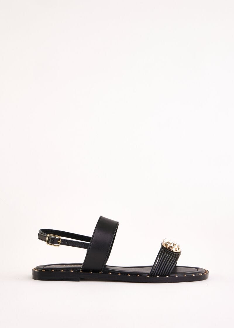 Flat black leather sandals