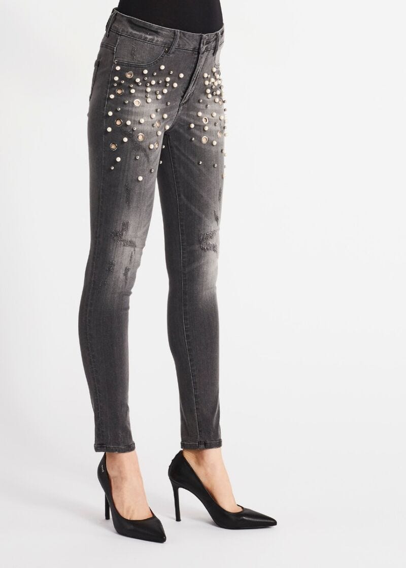 Skinny jeans with jewelled details 