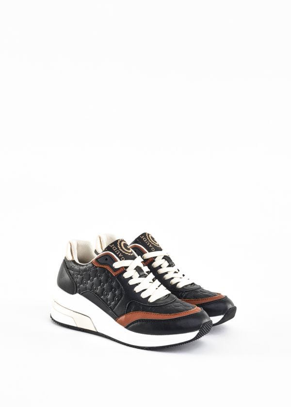Trainers with embossed print