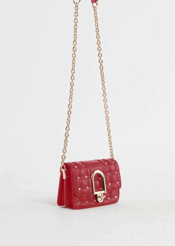 Quilted mini crossbody bag with studs