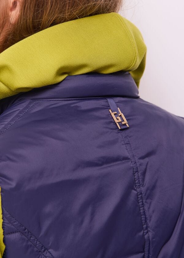 Women's blue padded nylon vest