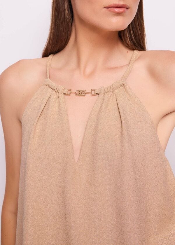 Top da donna con dettaglio gioiello