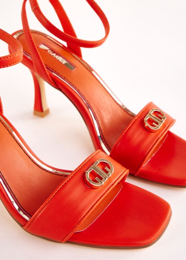 Sandales orange en matière synthétique