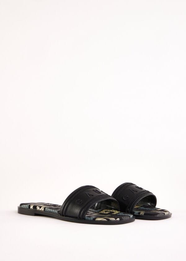 Mules noires en matière synthétique