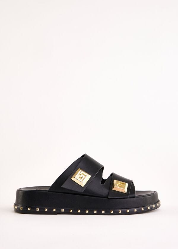 Black faux-leather sabots Gaudì Fashion