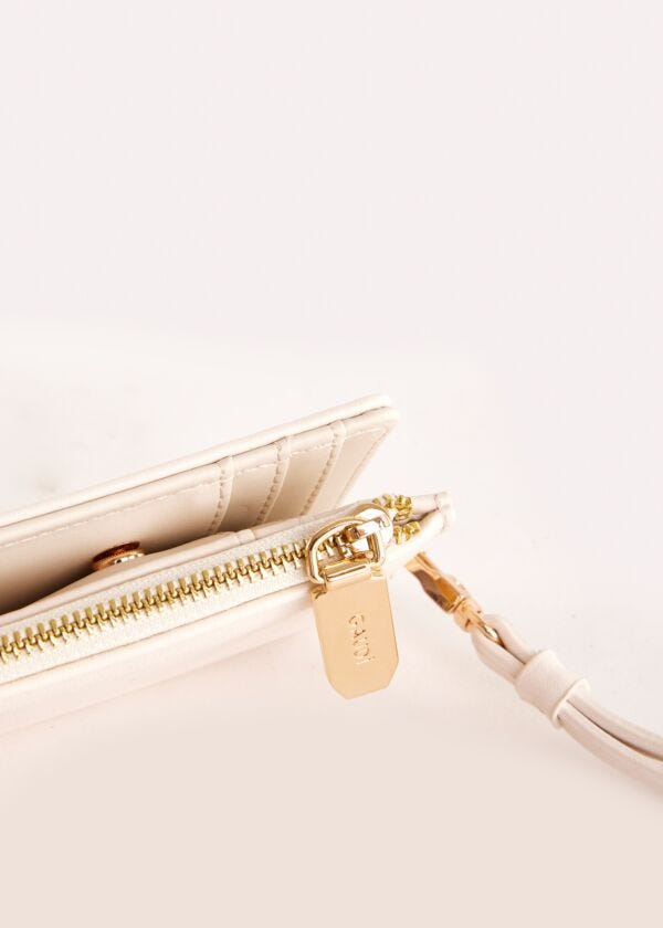 White faux-leather card holder