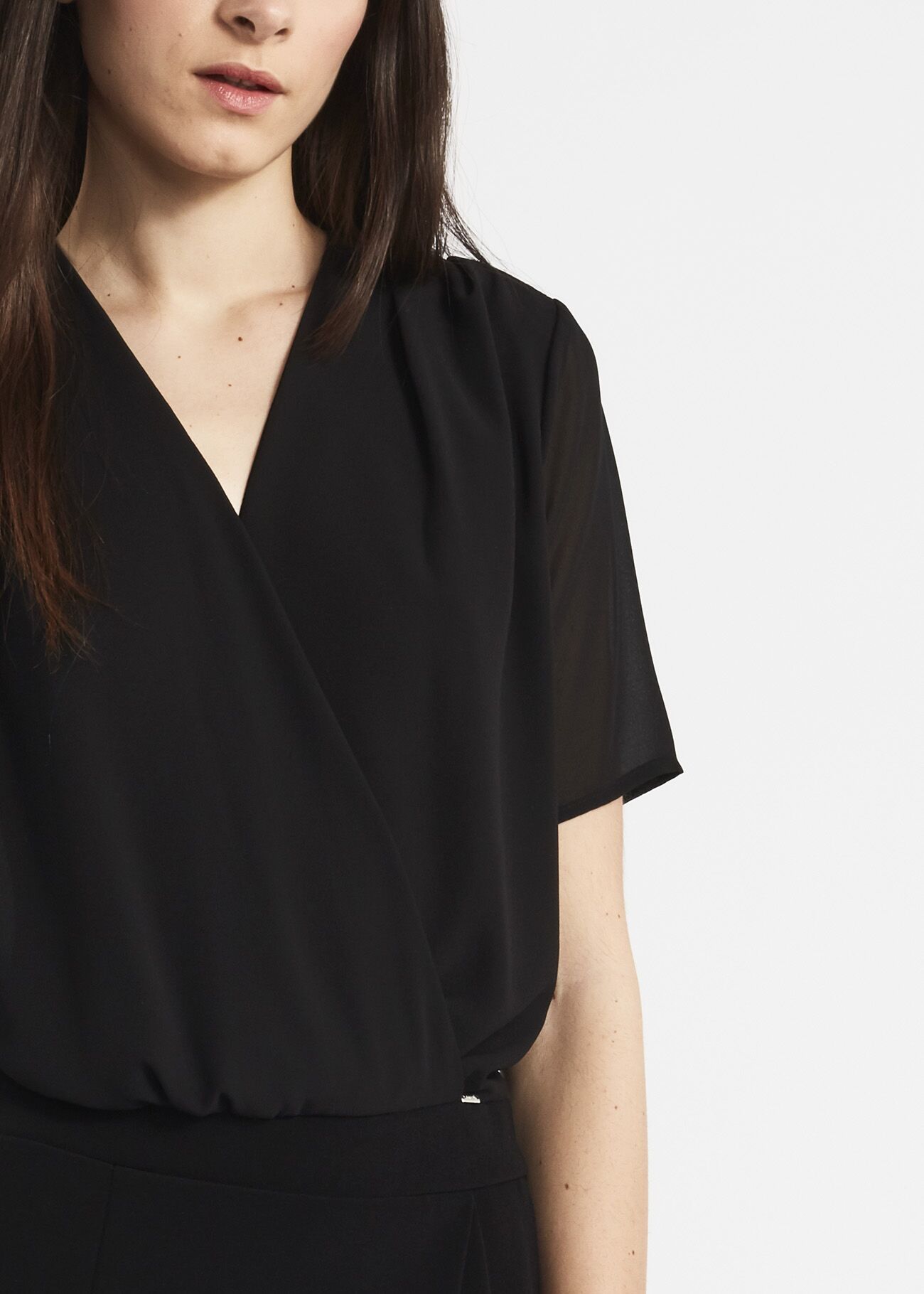 Jumpsuit with crossover pattern
