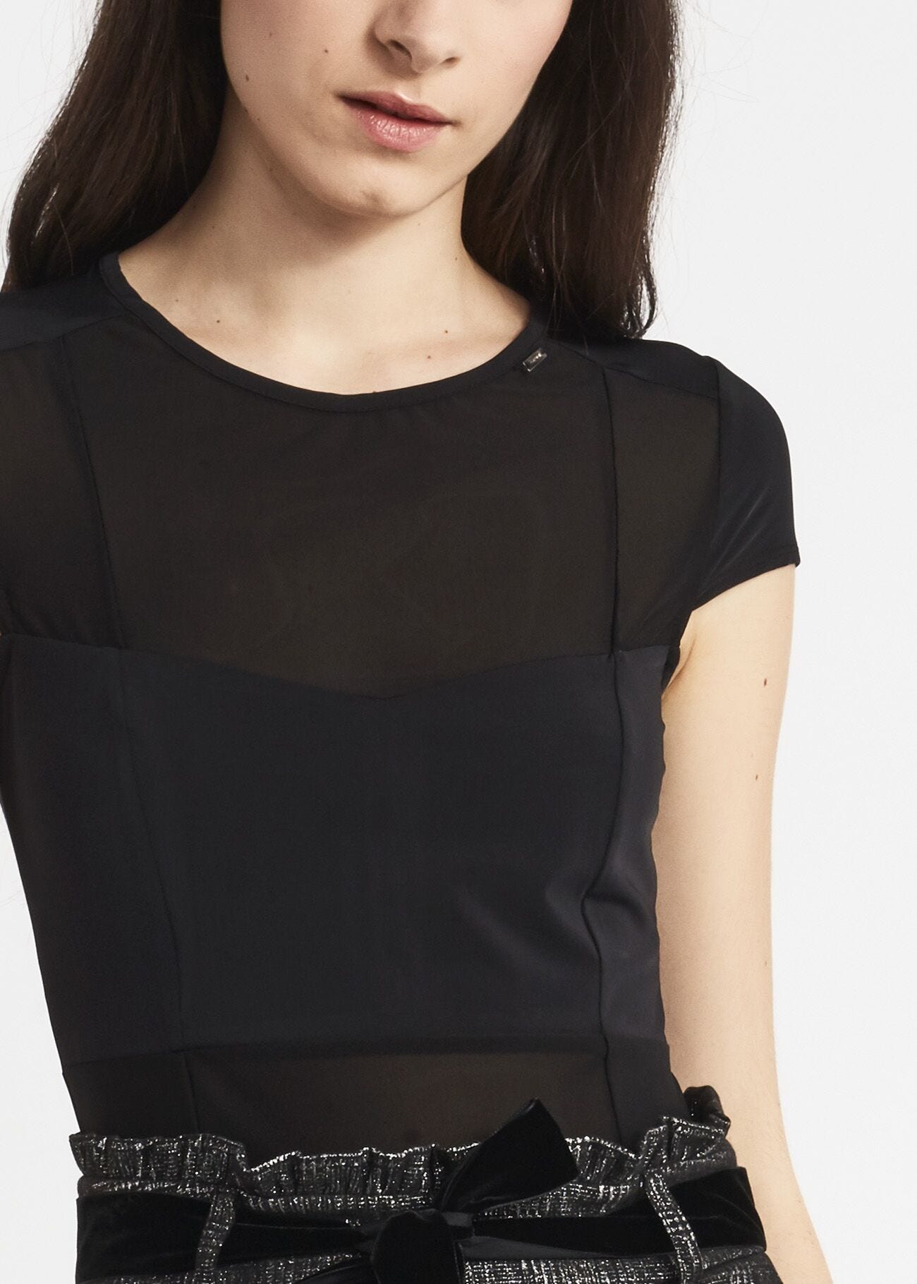 Bodysuit with transparent inserts
