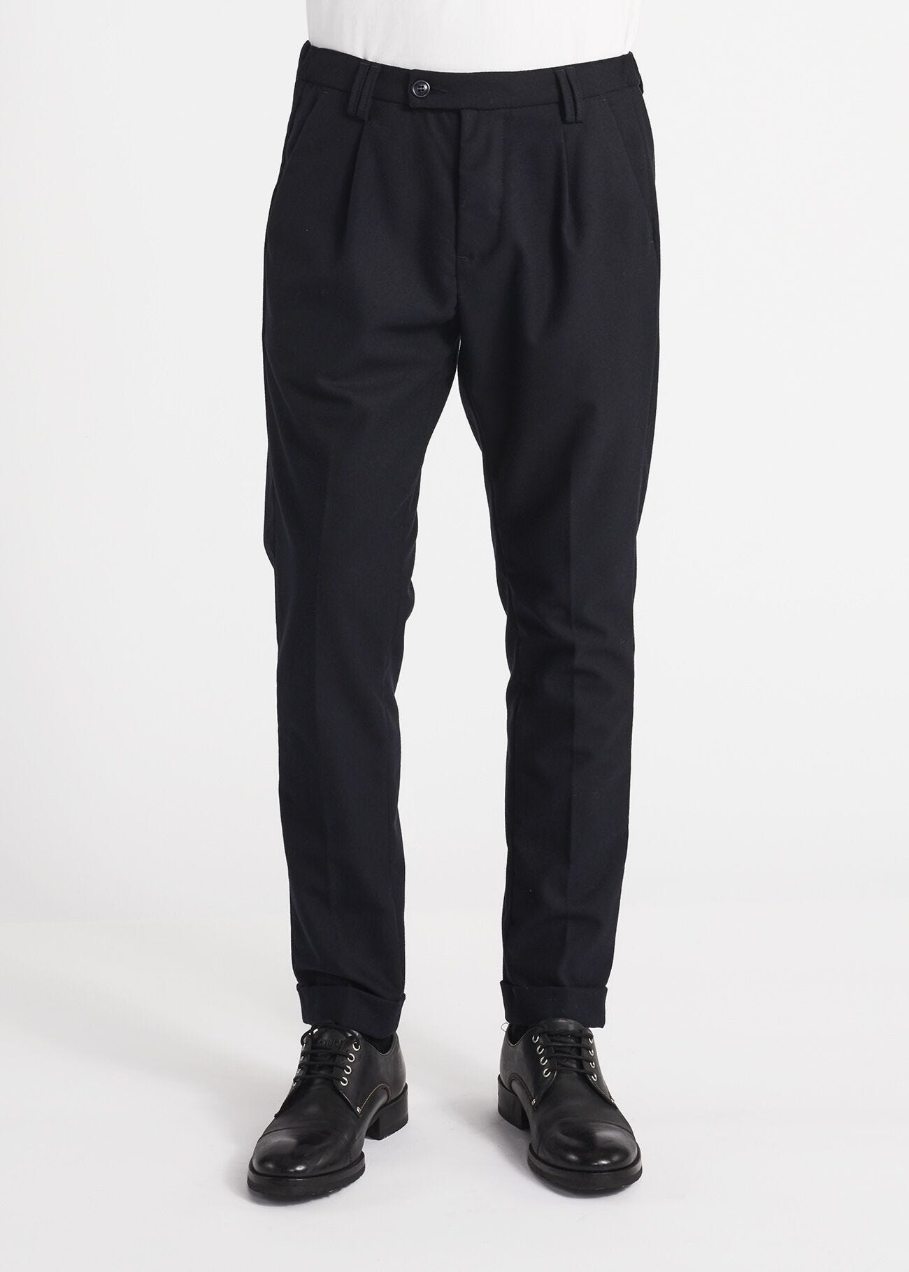 Trousers with elasticated waist insert
