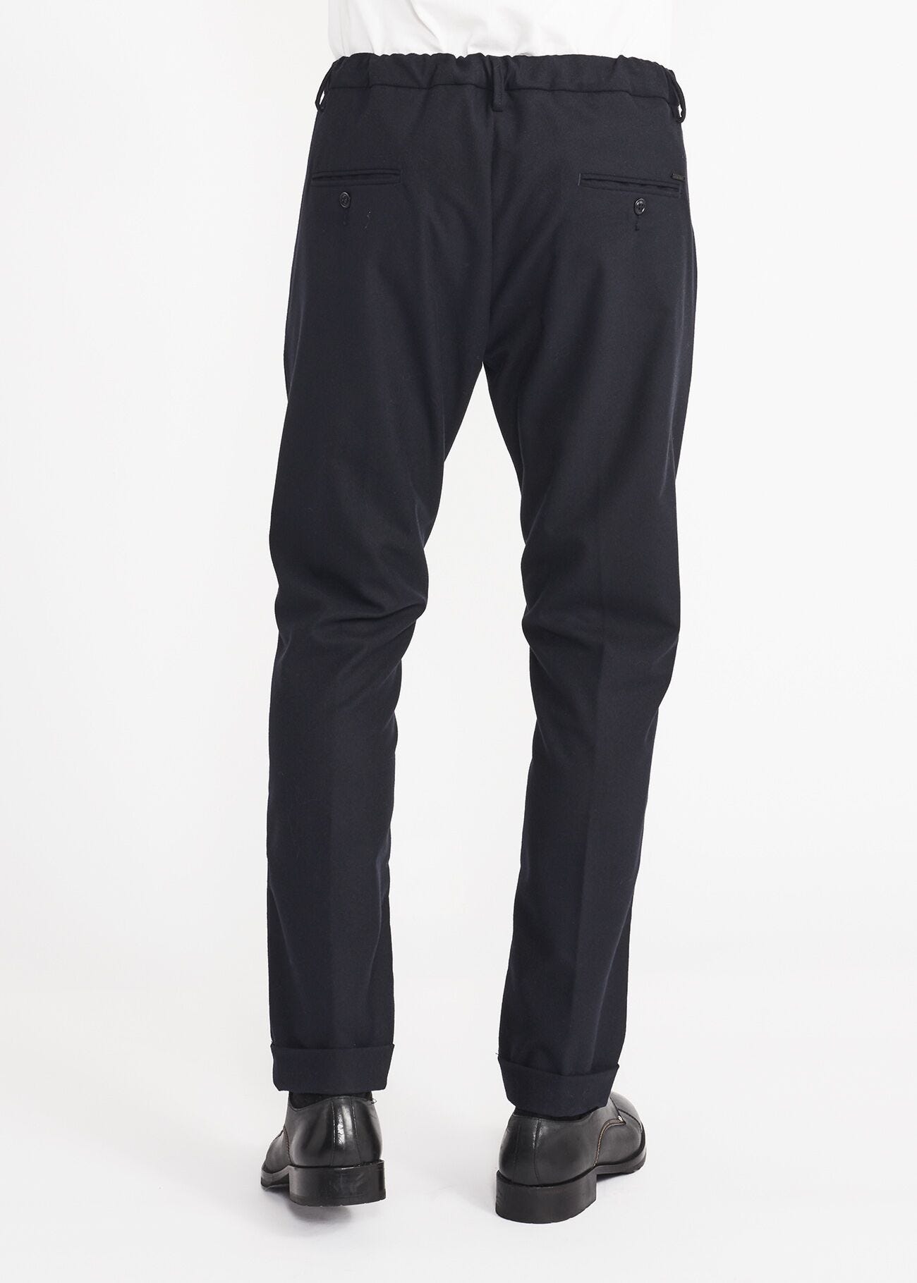 Trousers with elasticated waist insert