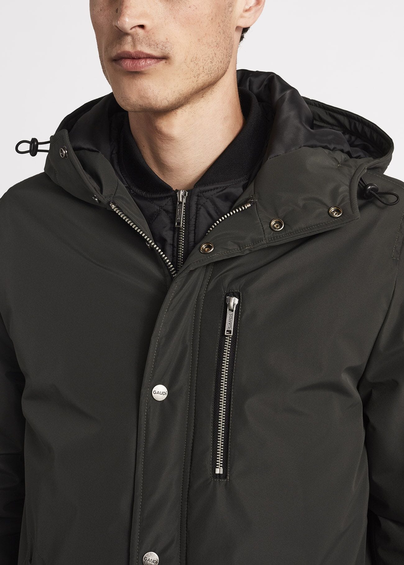 Parka with hood and storm flap