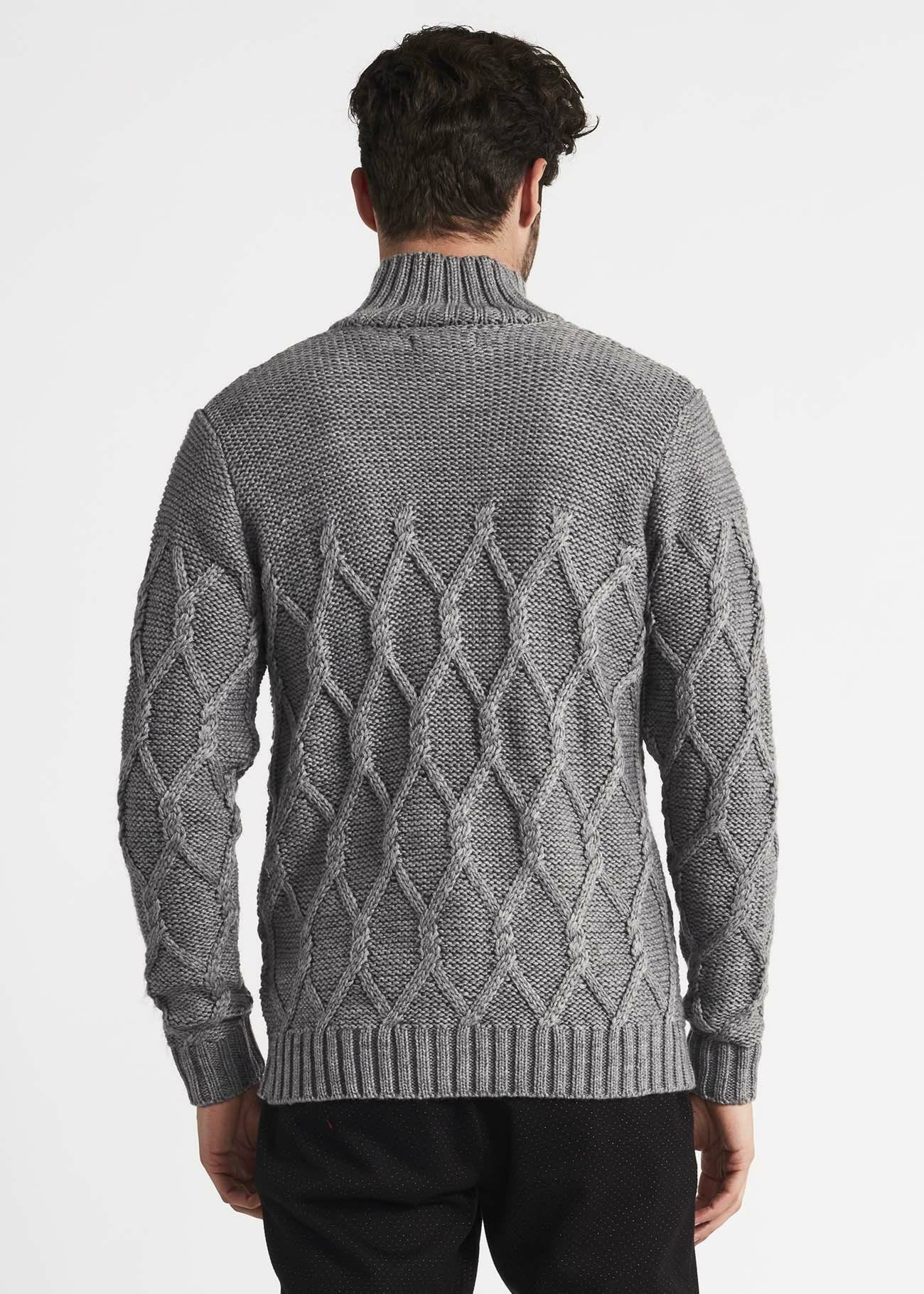 Maglia dolcevita a trecce