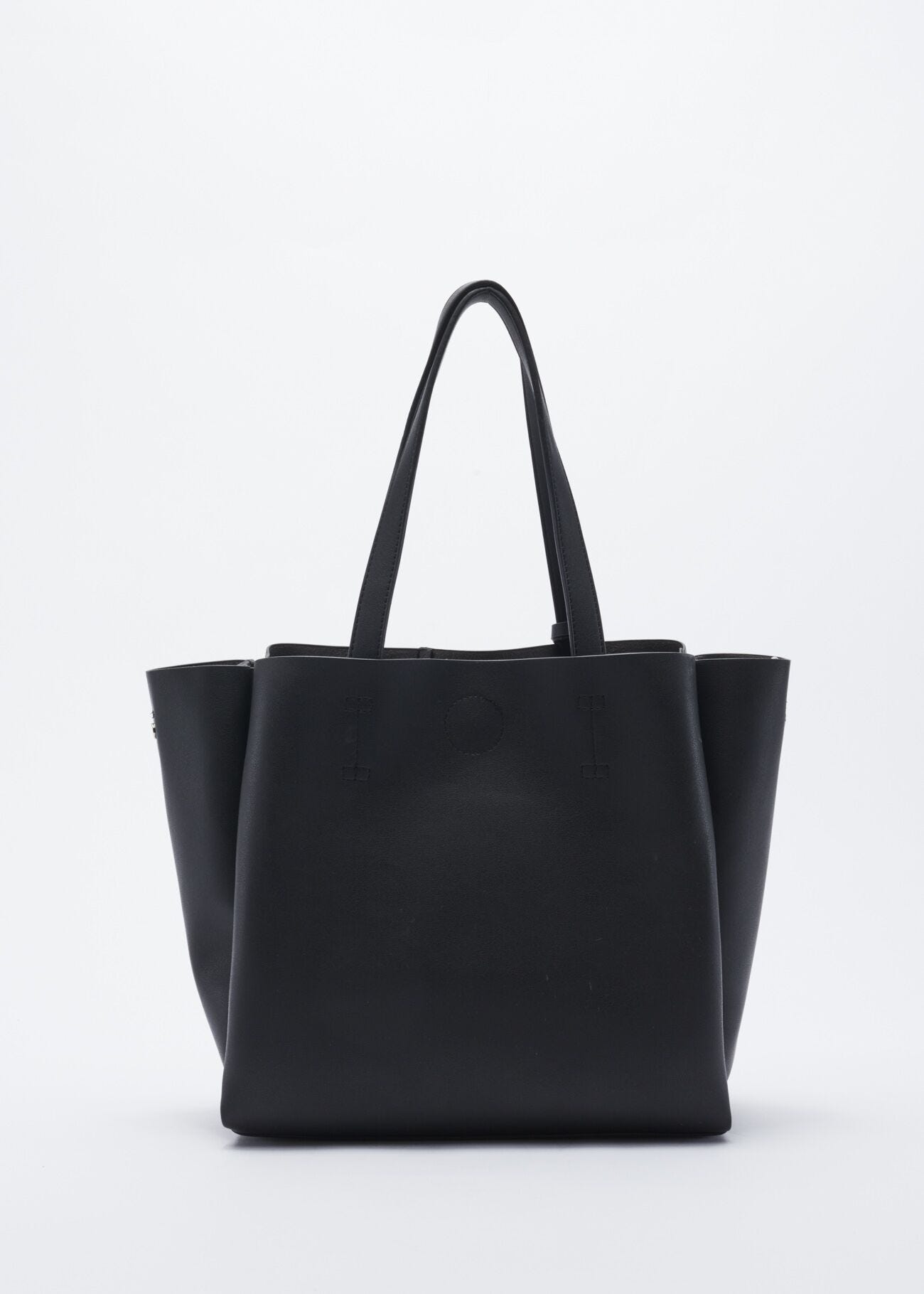 Bag with metal studs and star pattern