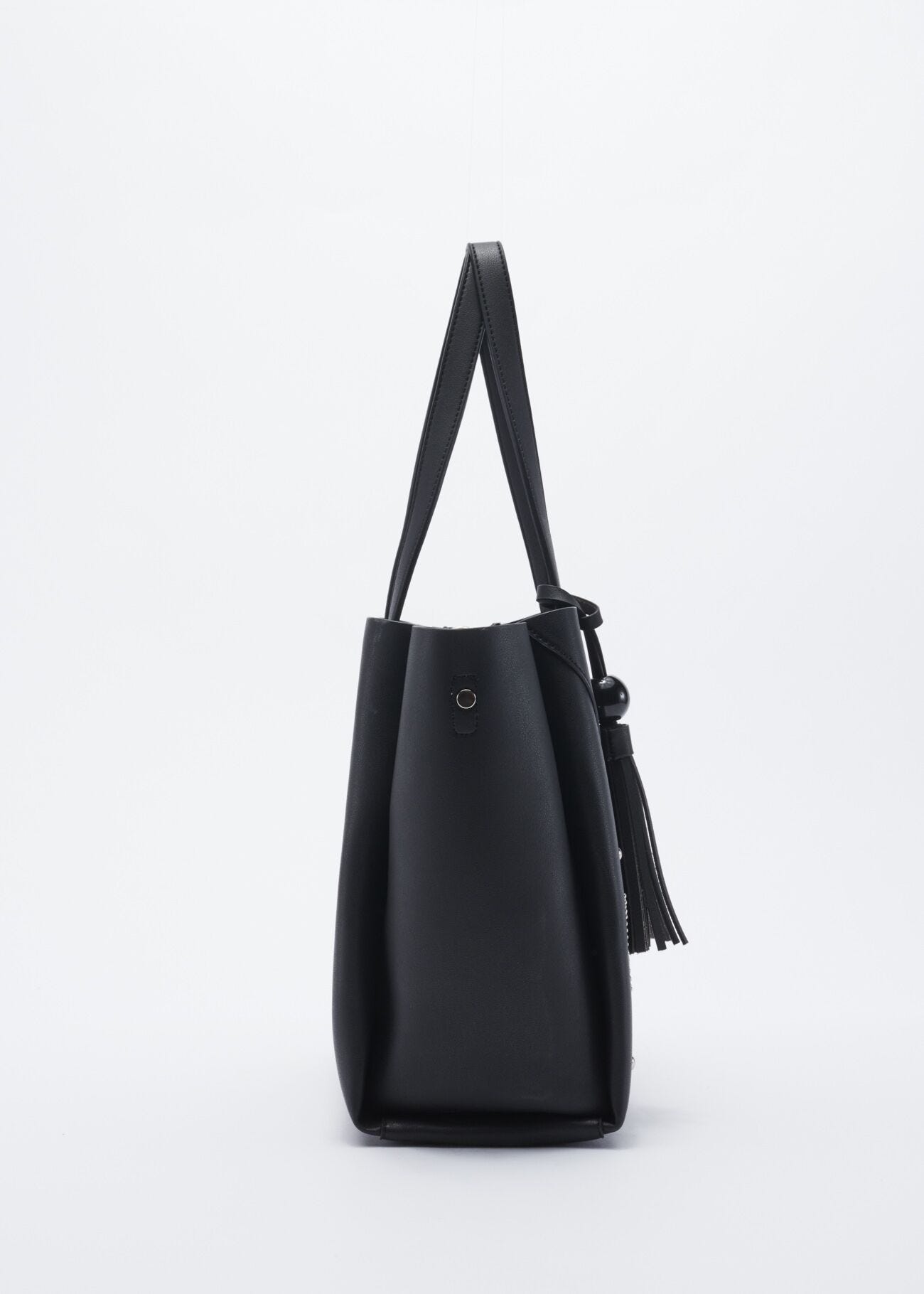 Bag with metal studs and star pattern