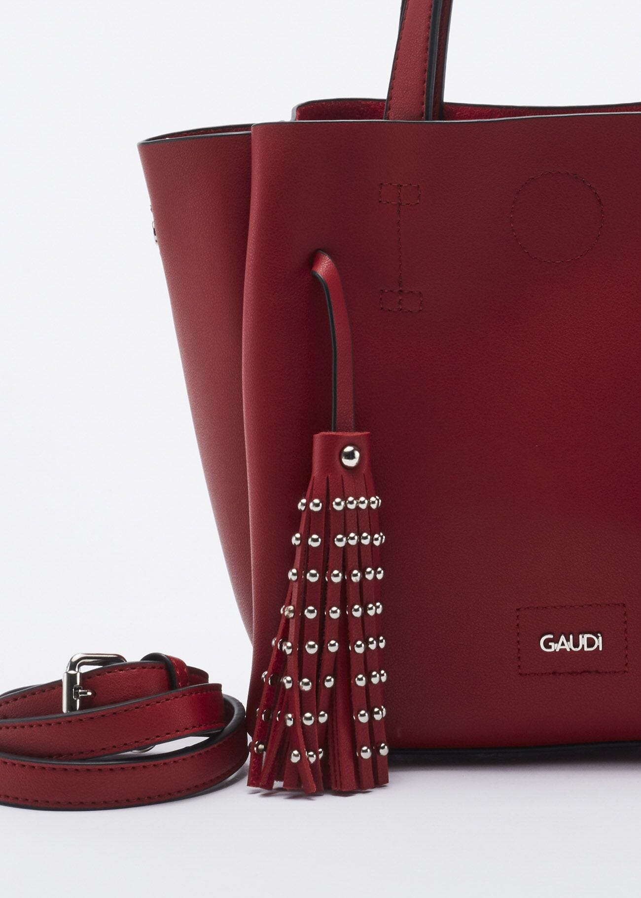 Bag with studded hanging tassels
