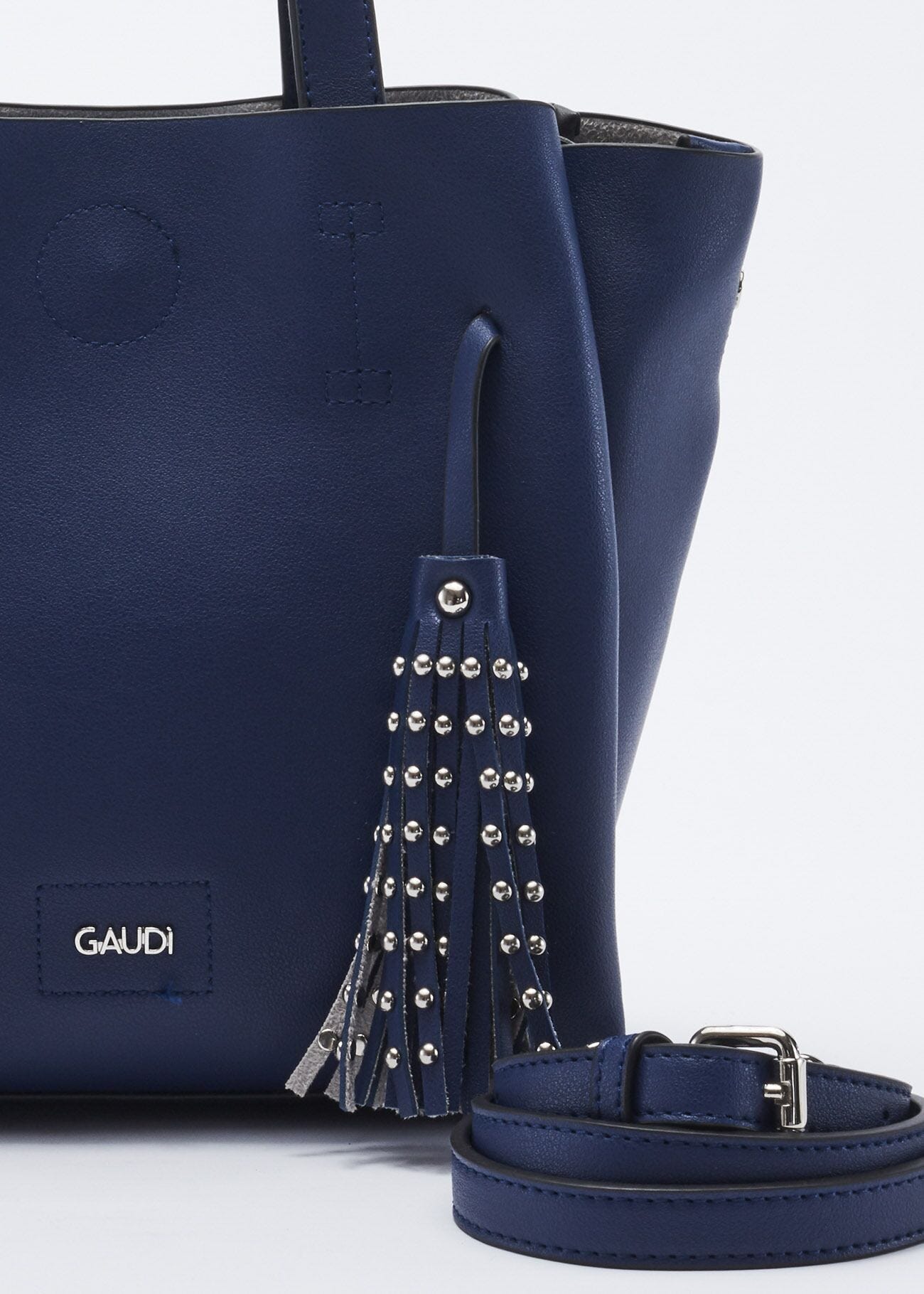 Bag with studded hanging tassels