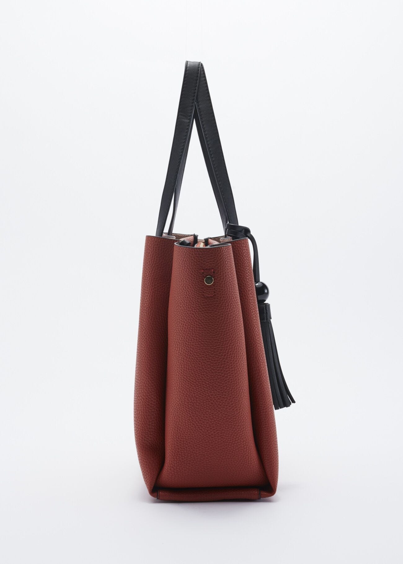 Bag with contrasting colour handles