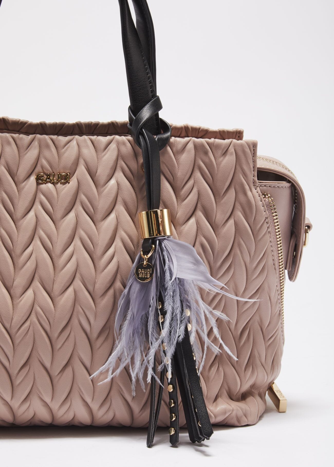 Keyring with studs and feathers