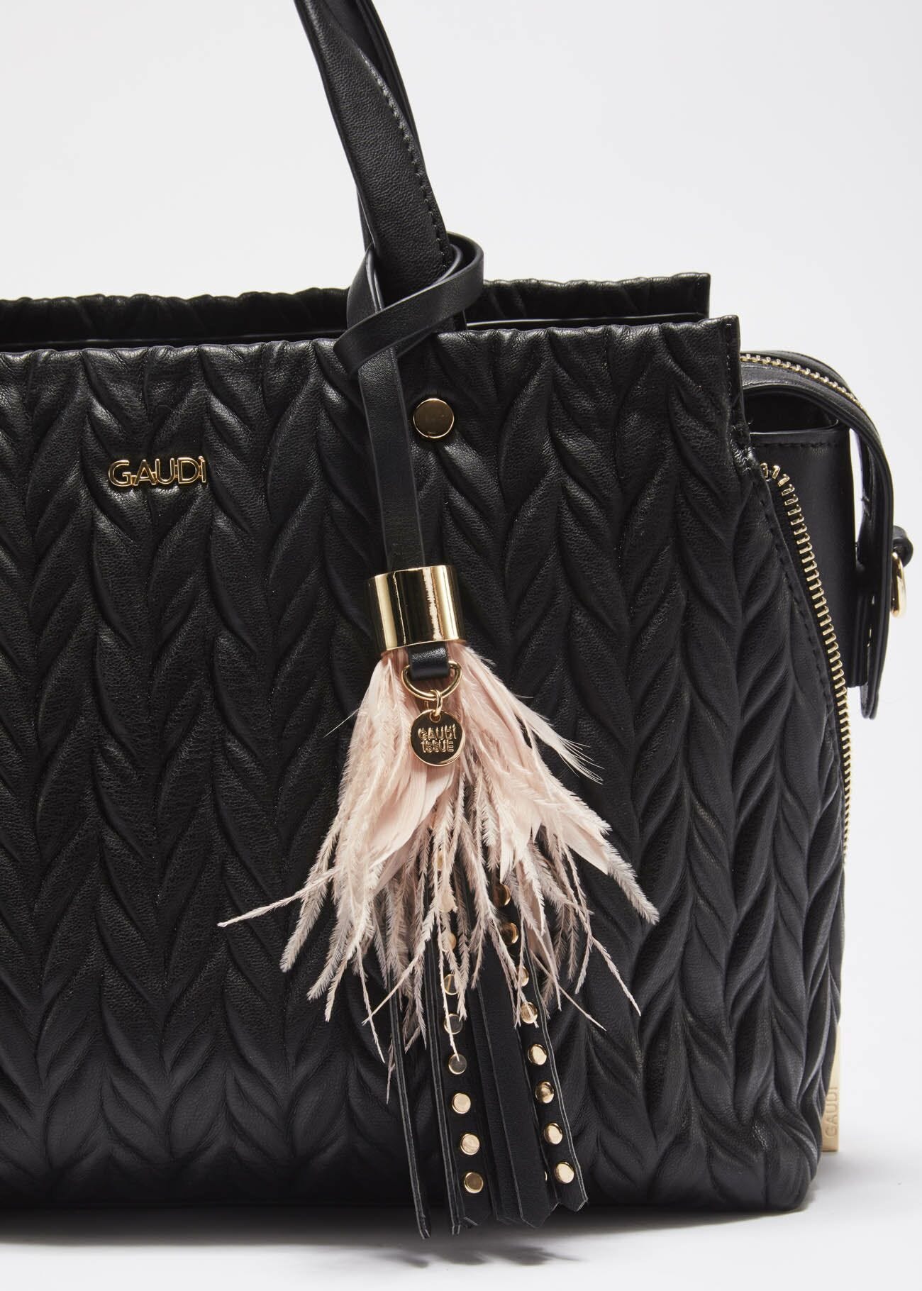 Keyring with studs and feathers
