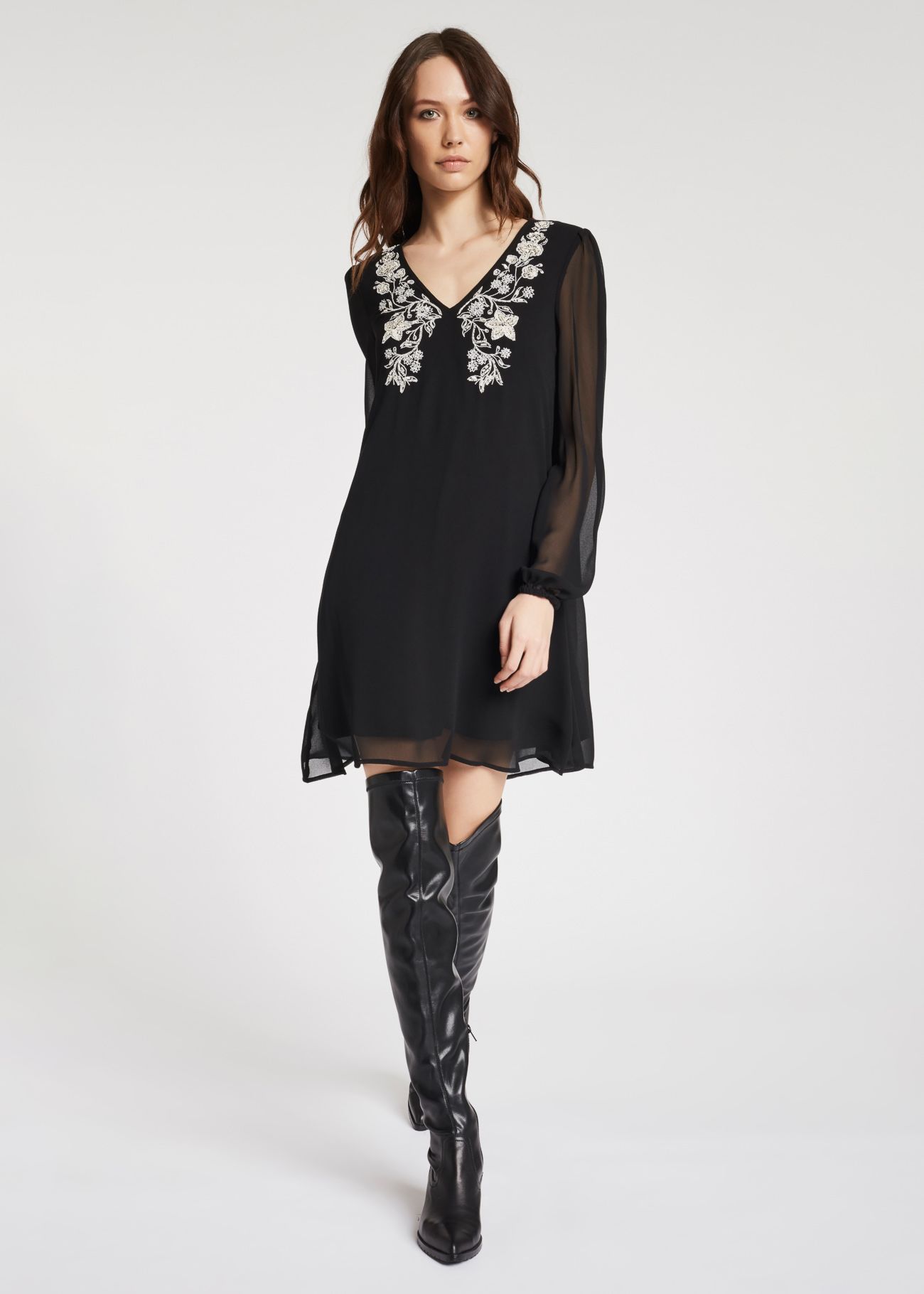 Dress with embroidered neckline