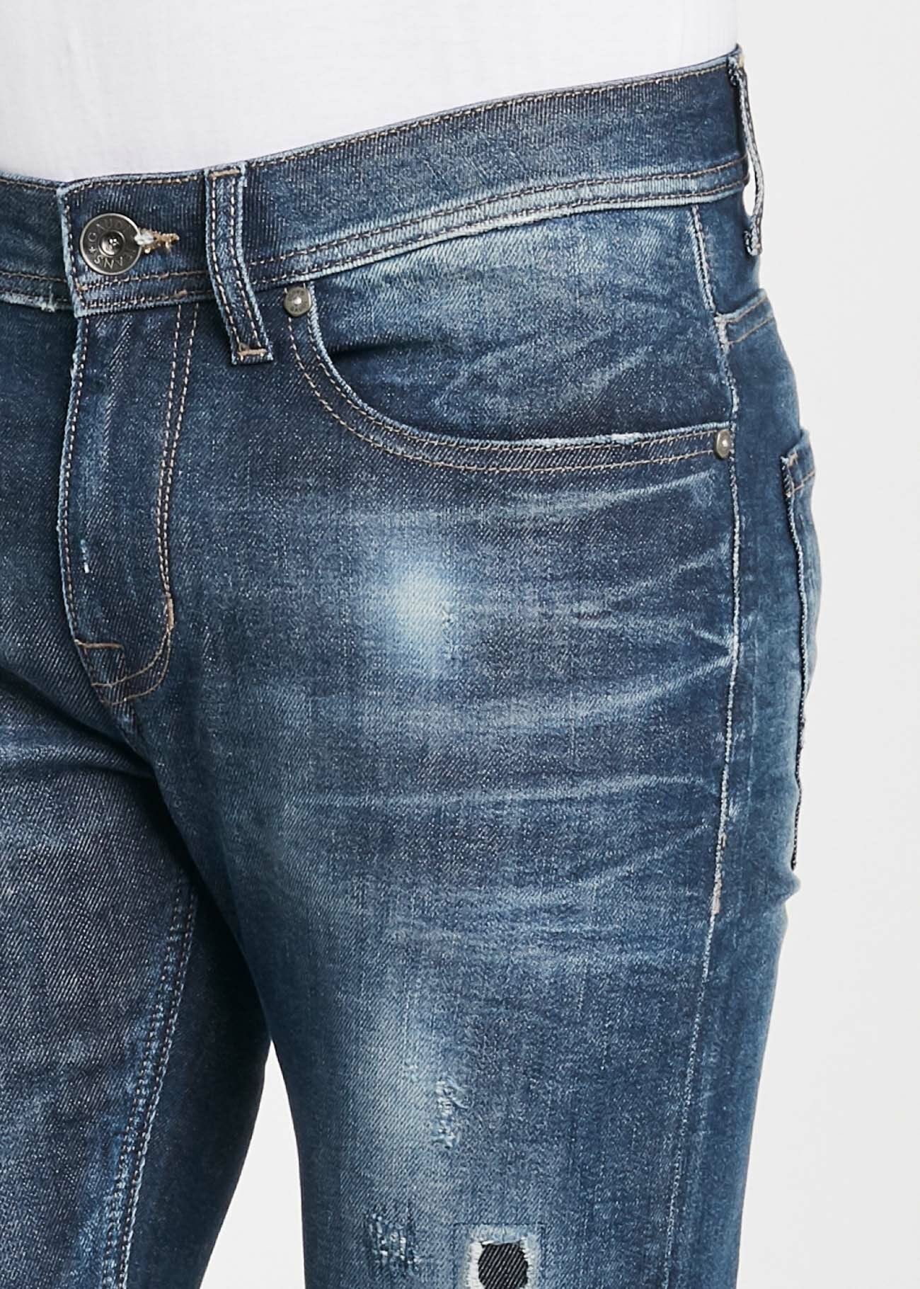 Jeans with destroyed details