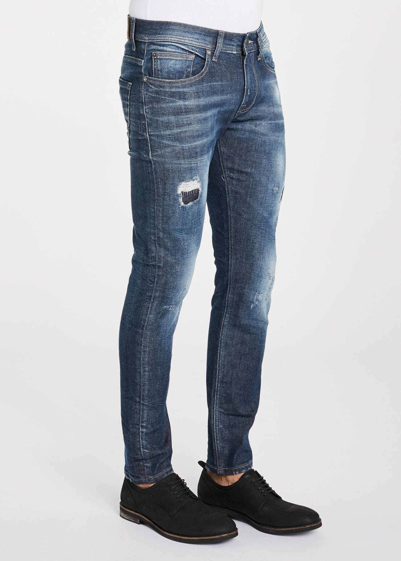 Jeans with destroyed details