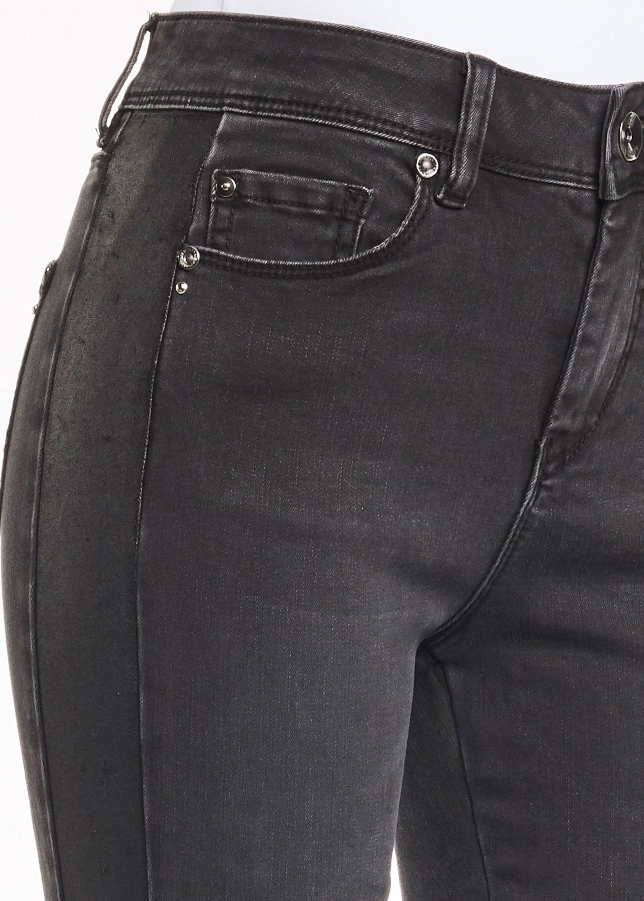 Jeans with faux leather insert