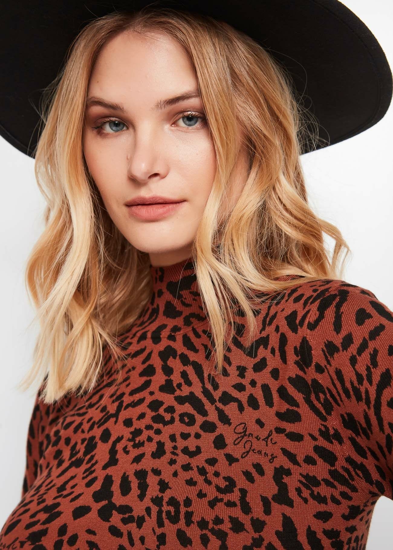 Polo neck with animal print