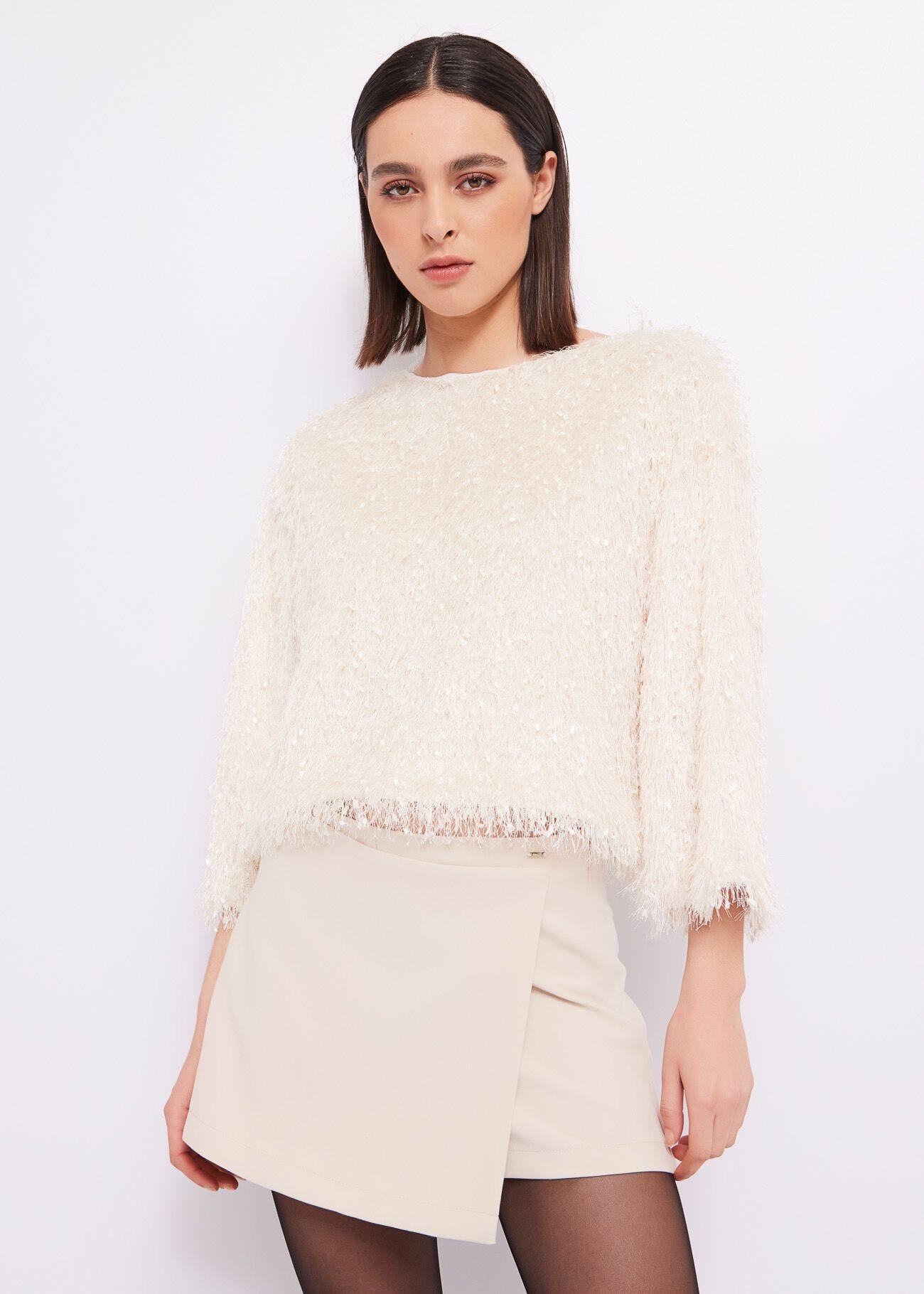 Top con piume