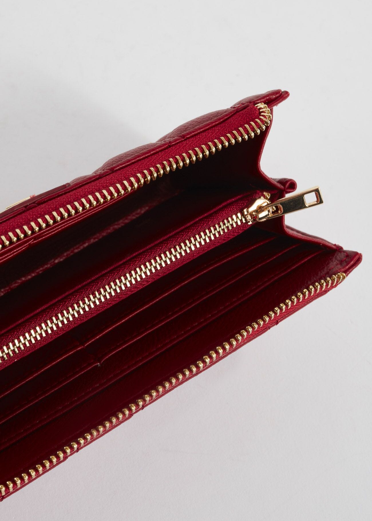 Quilted wallet with studs