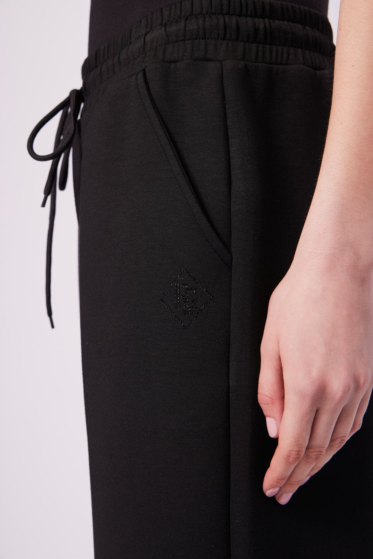 Black scuba trousers