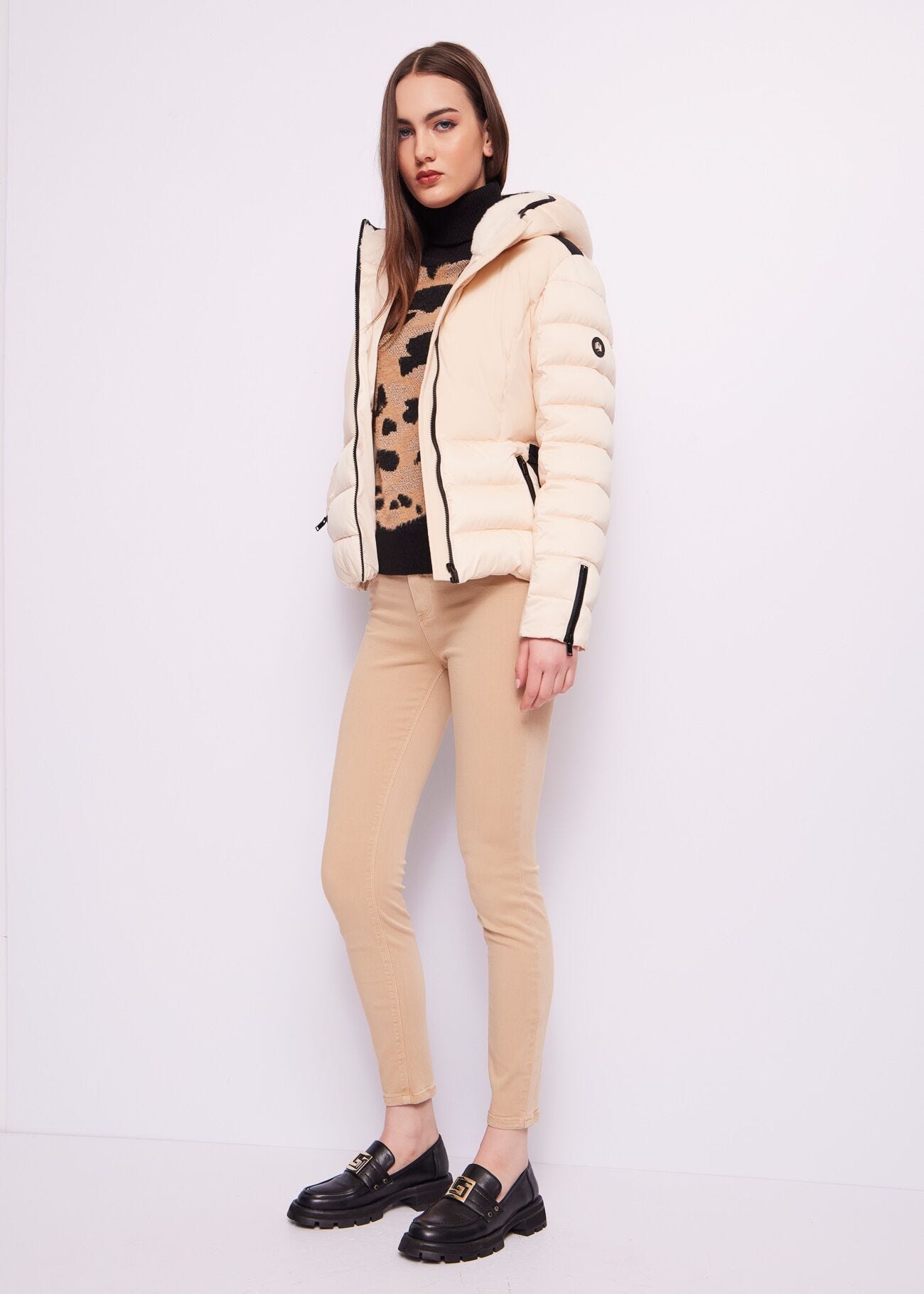 Cropped nylon down jacket.