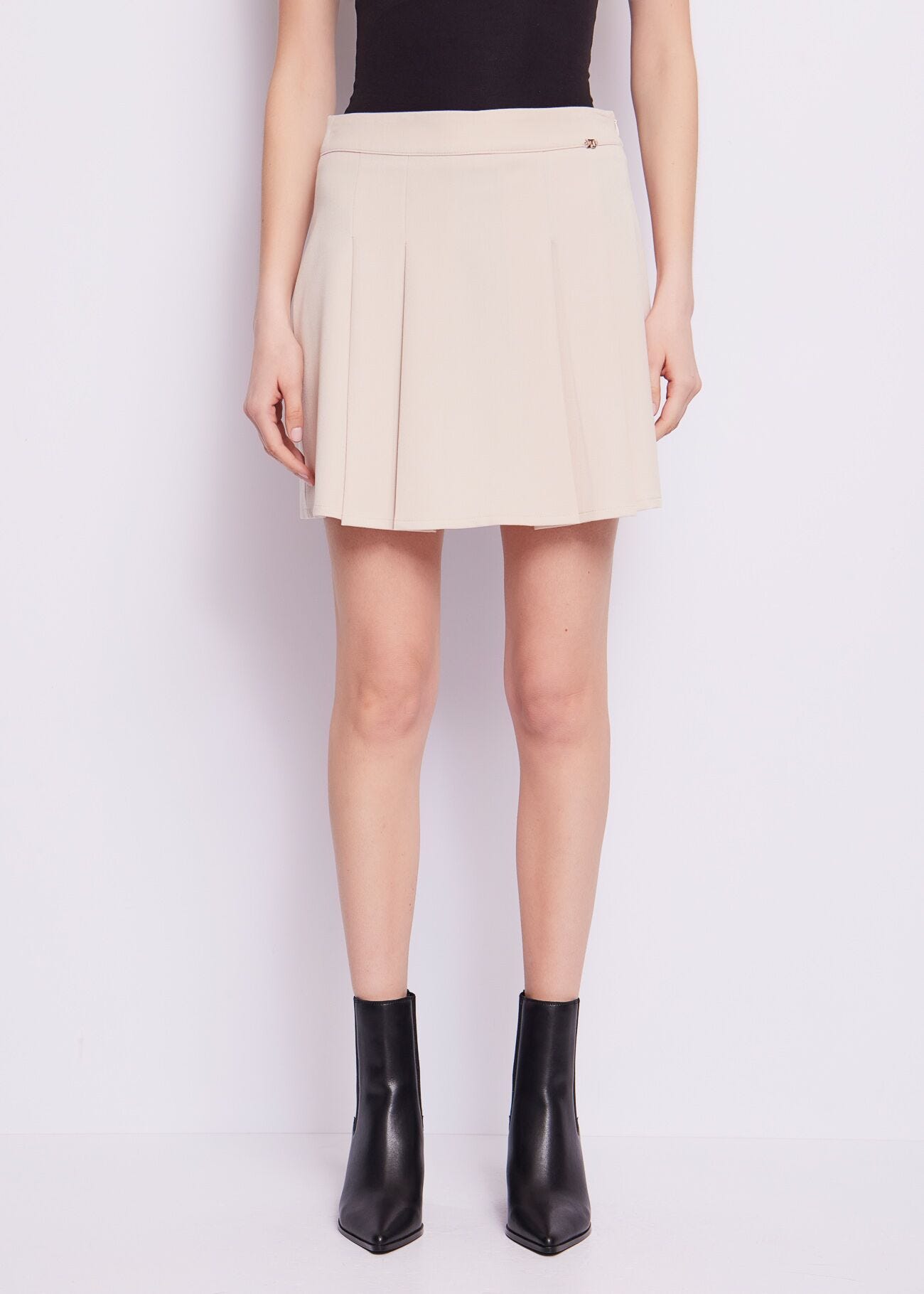 Beige pleated miniskirt