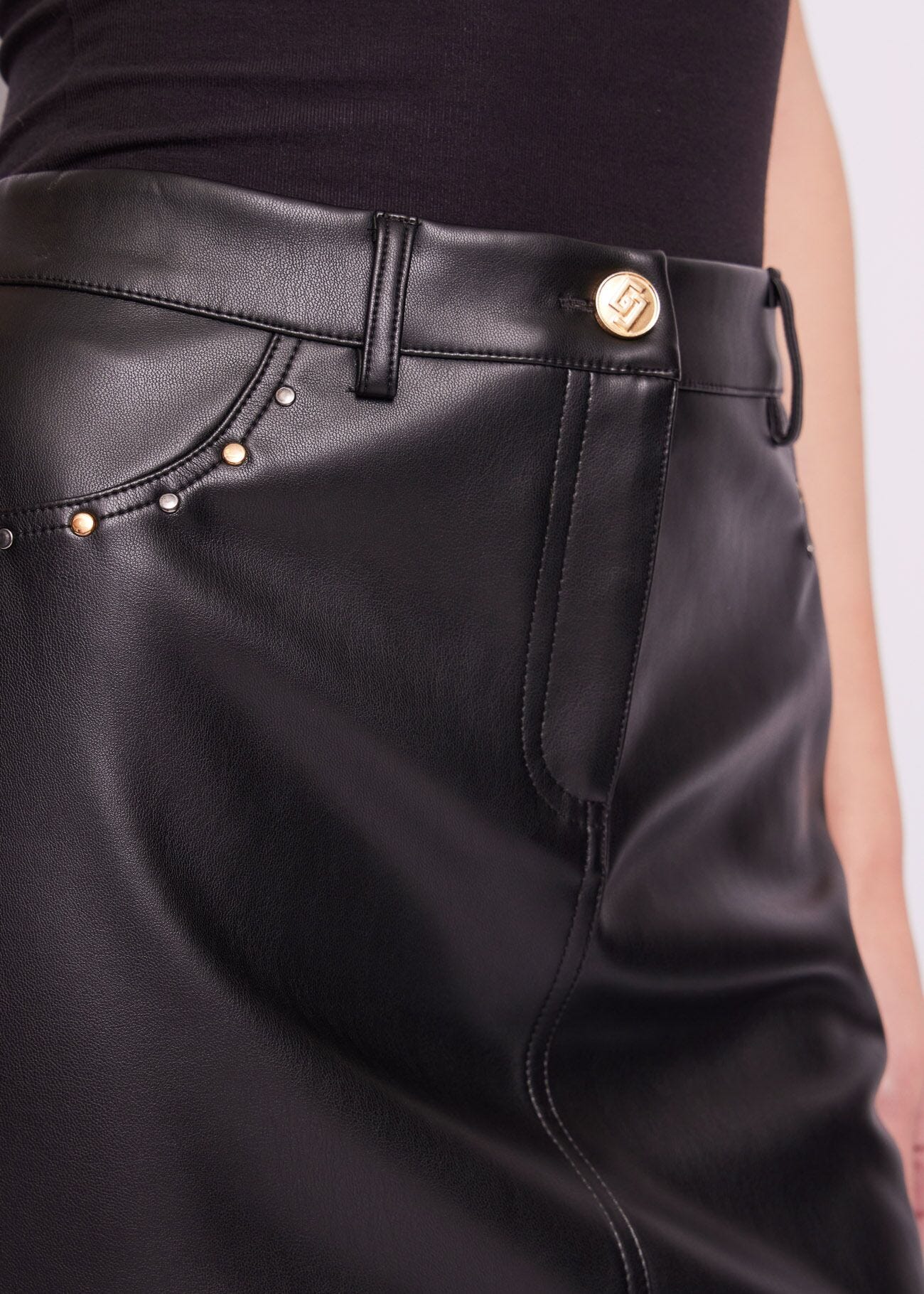 Black leatherette miniskirt