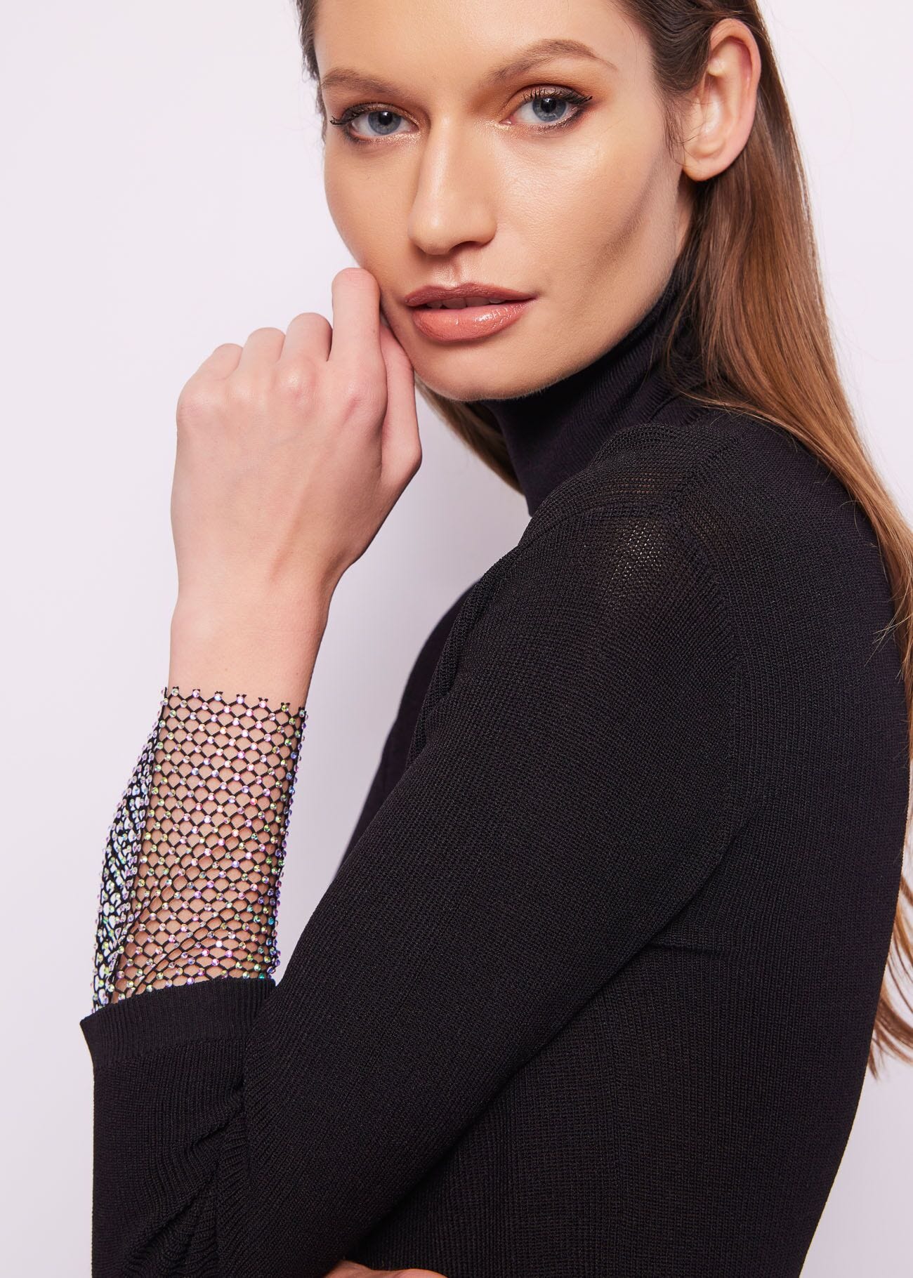 Maglia dolcevita con rete e strass